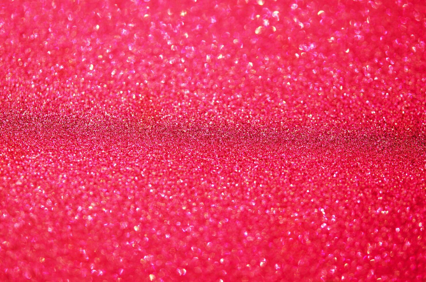 Red glitter bokeh background. Festive concept. - Image photo