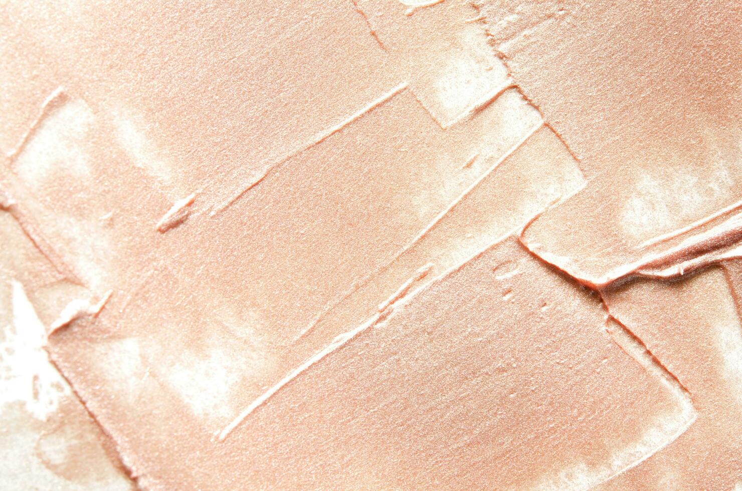 Beige smears of crushed highlighter or luminizer. - Image photo