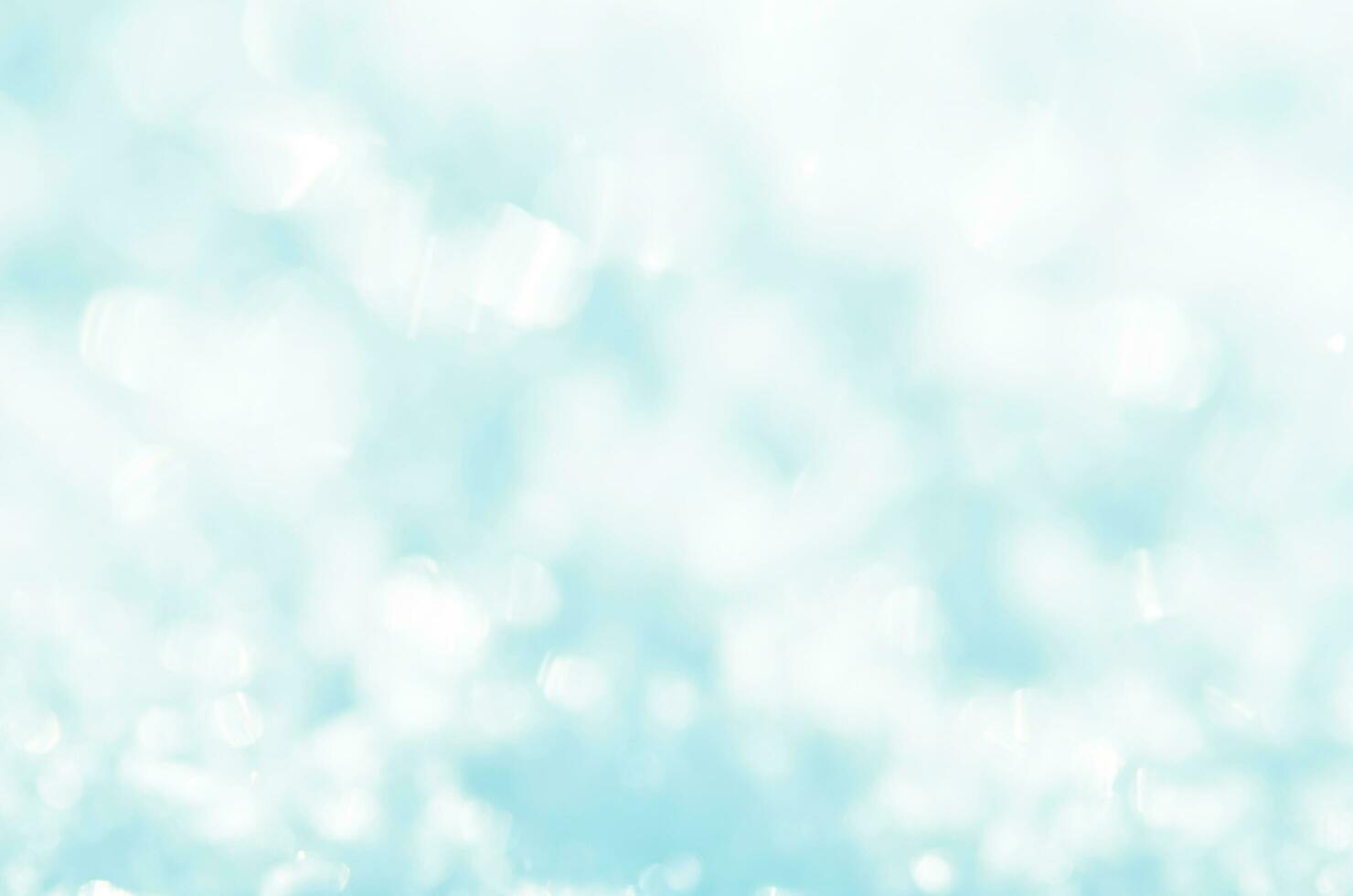 Snow sparkle background. Abstract blue bokeh background. photo
