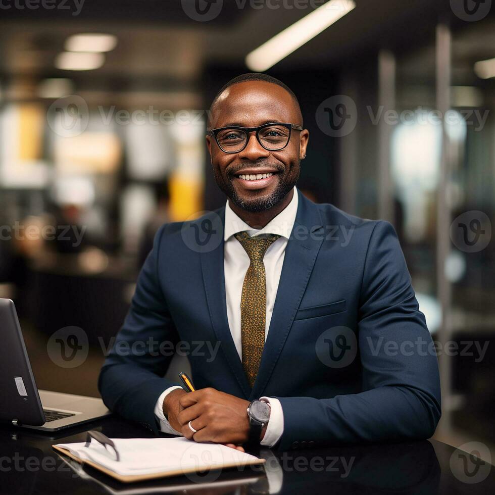 Dark-skinned African-American man smiling, a businessman in an office at a desk with a laptop.Generative AI photo