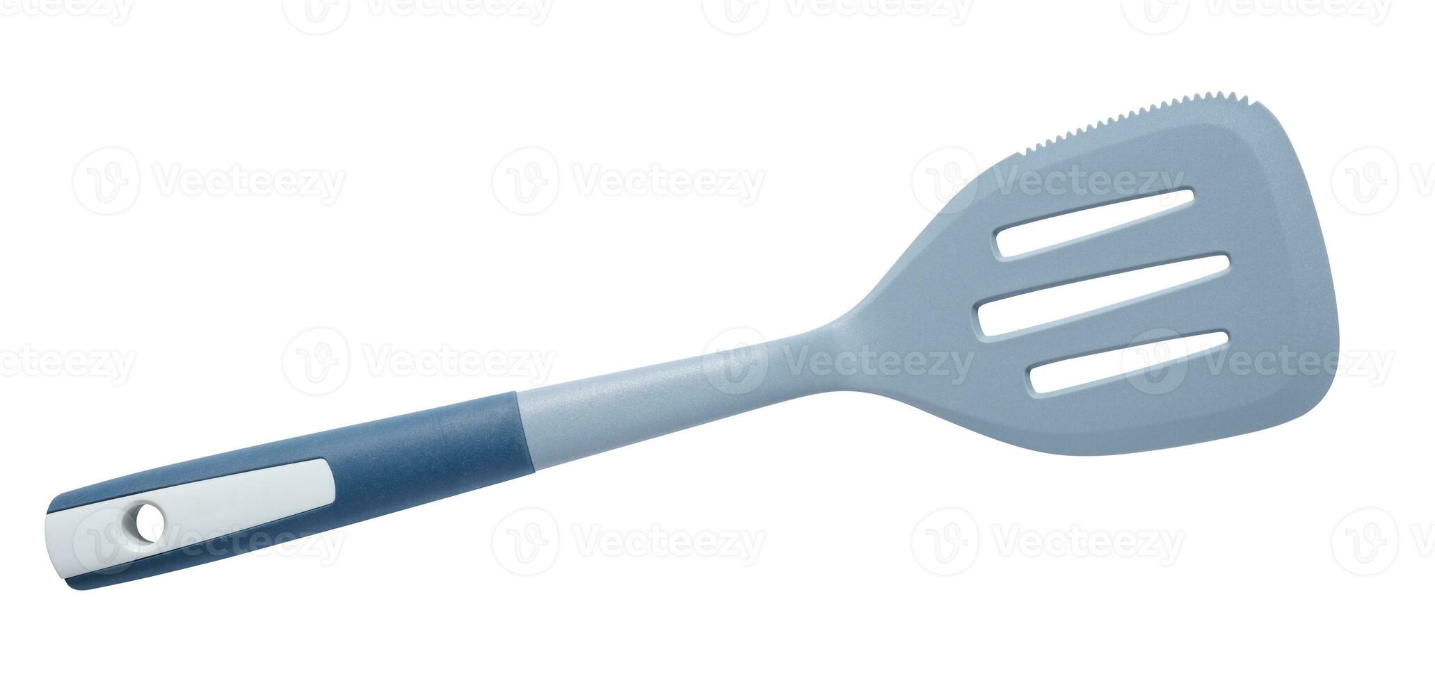 Plastic gray spatula for cooking on a white isolated background, photo