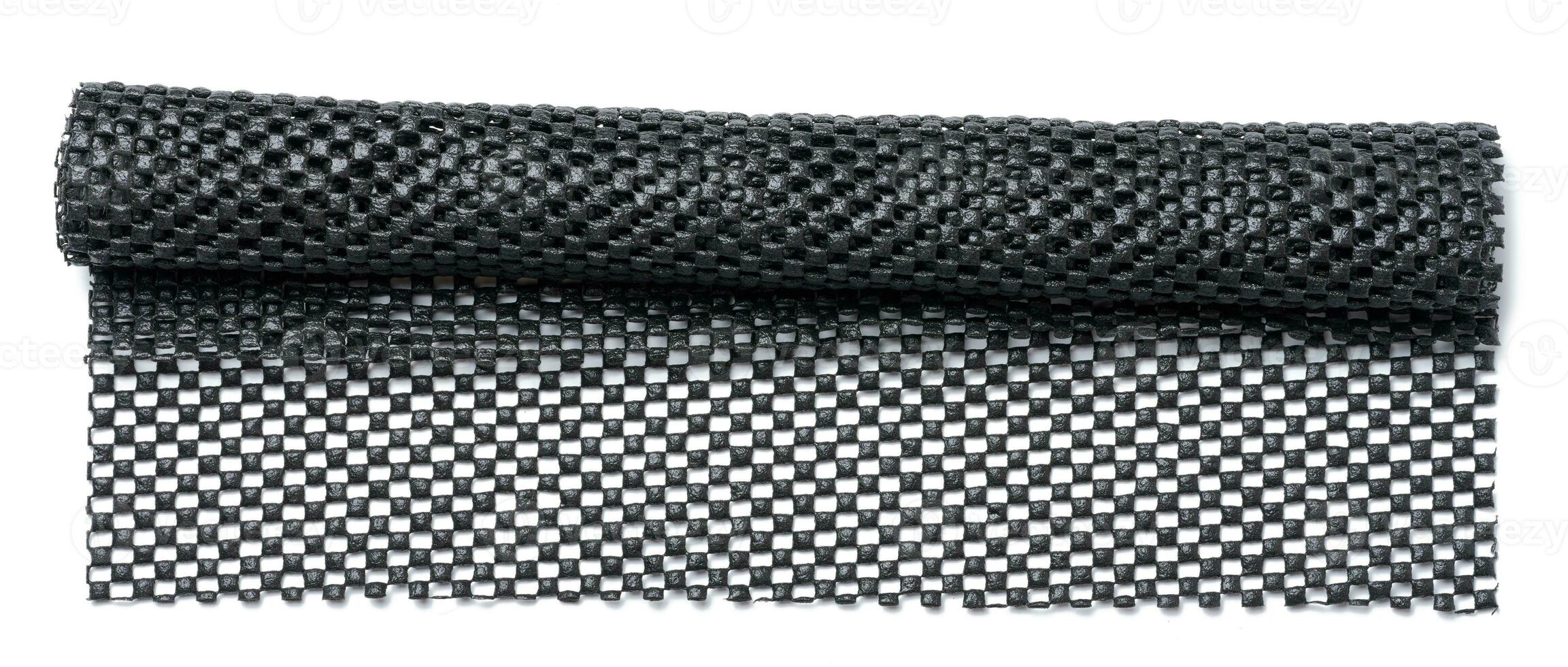 Rolled rubber mat on white isolated background photo