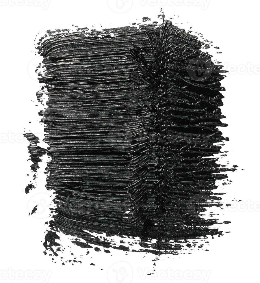 Swatch of black smudged acrylic paint isolated on white background, close up photo