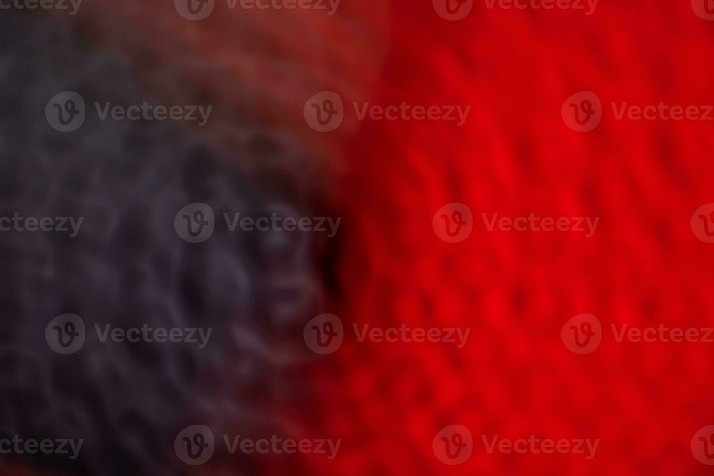 Defocused abstract background of red, black and white colors. Toned. photo