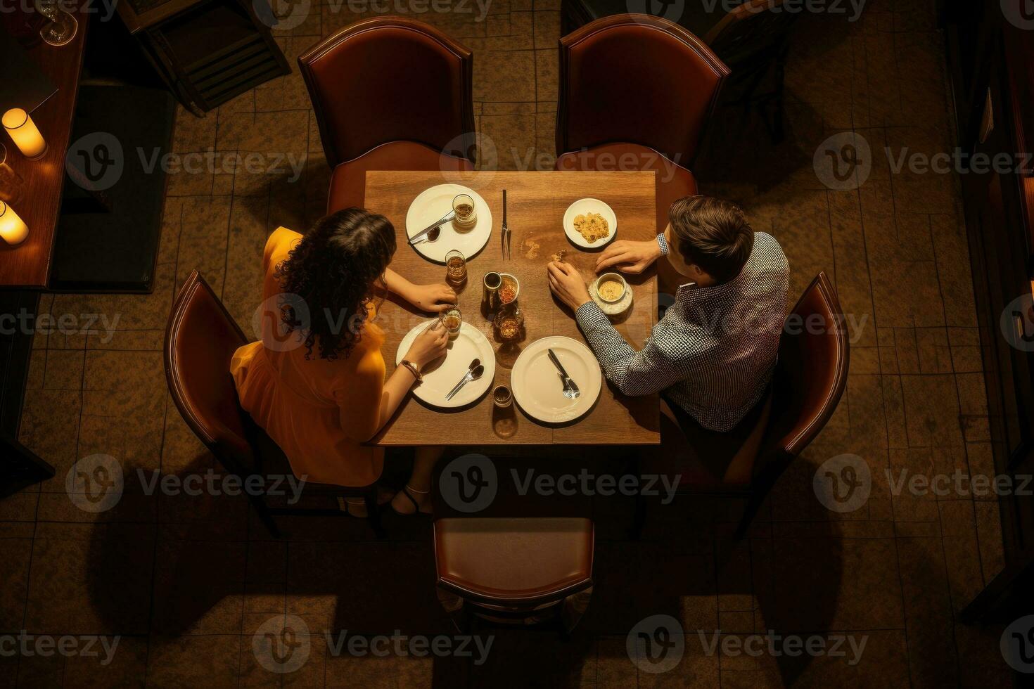 Top view of young couple having romantic dinner in restaurant, looking at each other, Couple Having Dinner Date at Restaurant, top view, AI Generated photo