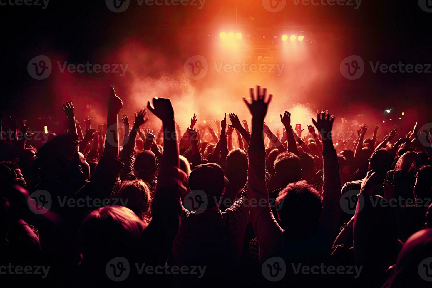 Concert crowd at a music festival in front of a bright sunset, Crowd cheering at a live music concert and raising hands up, AI Generated photo