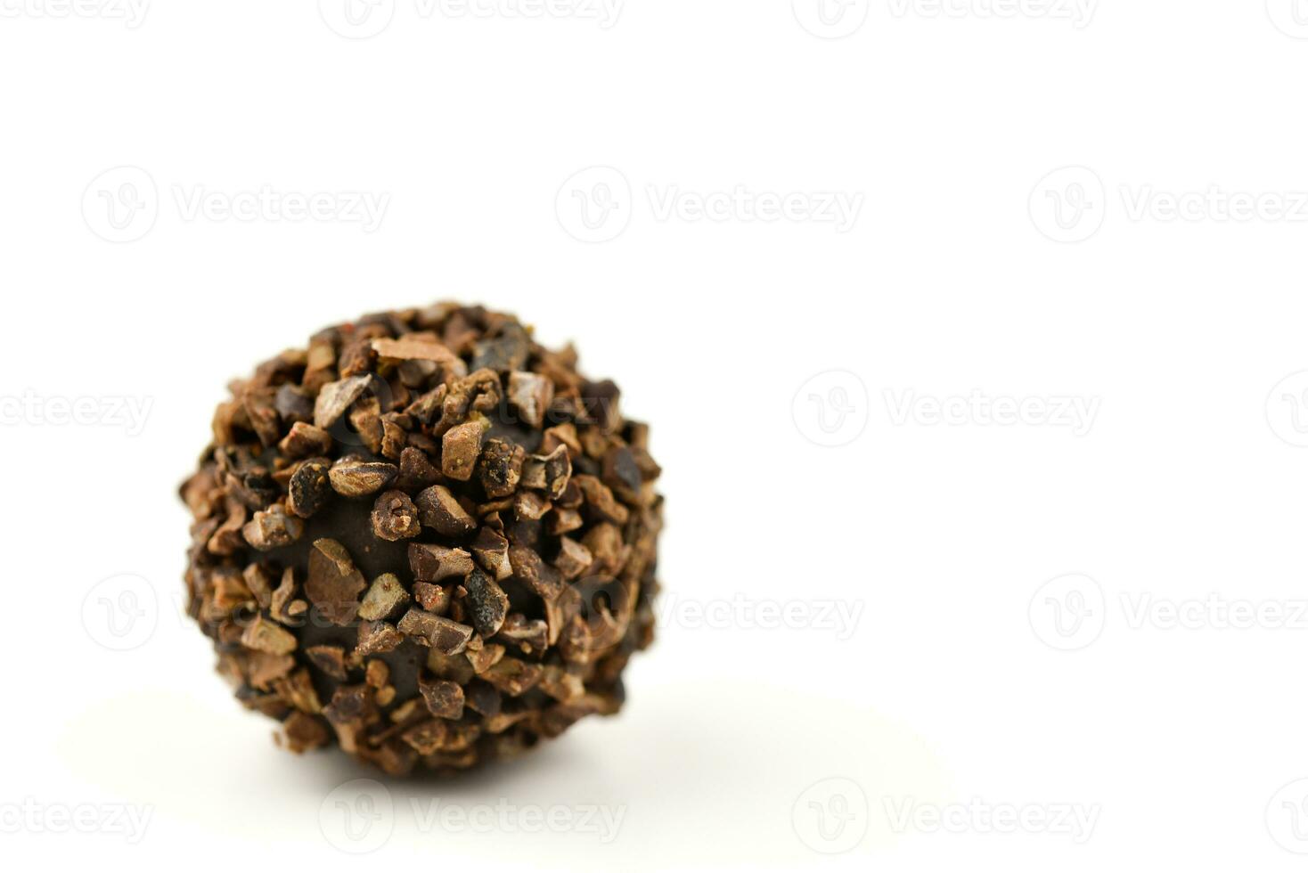 Handmade chocolate candies on white background photo