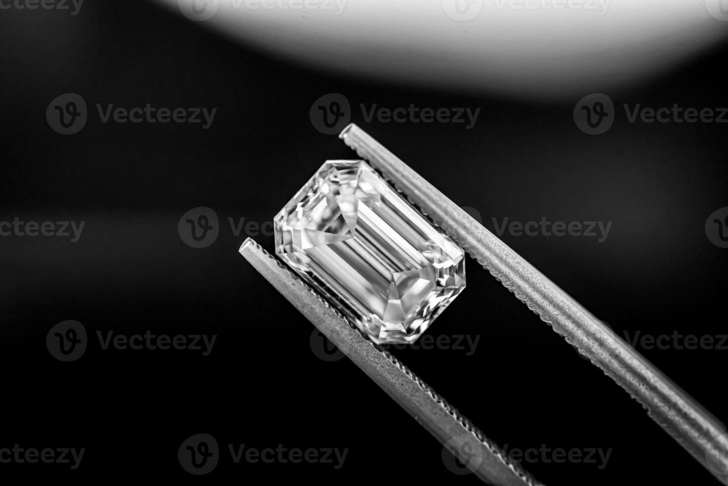 Diamond on black background photo