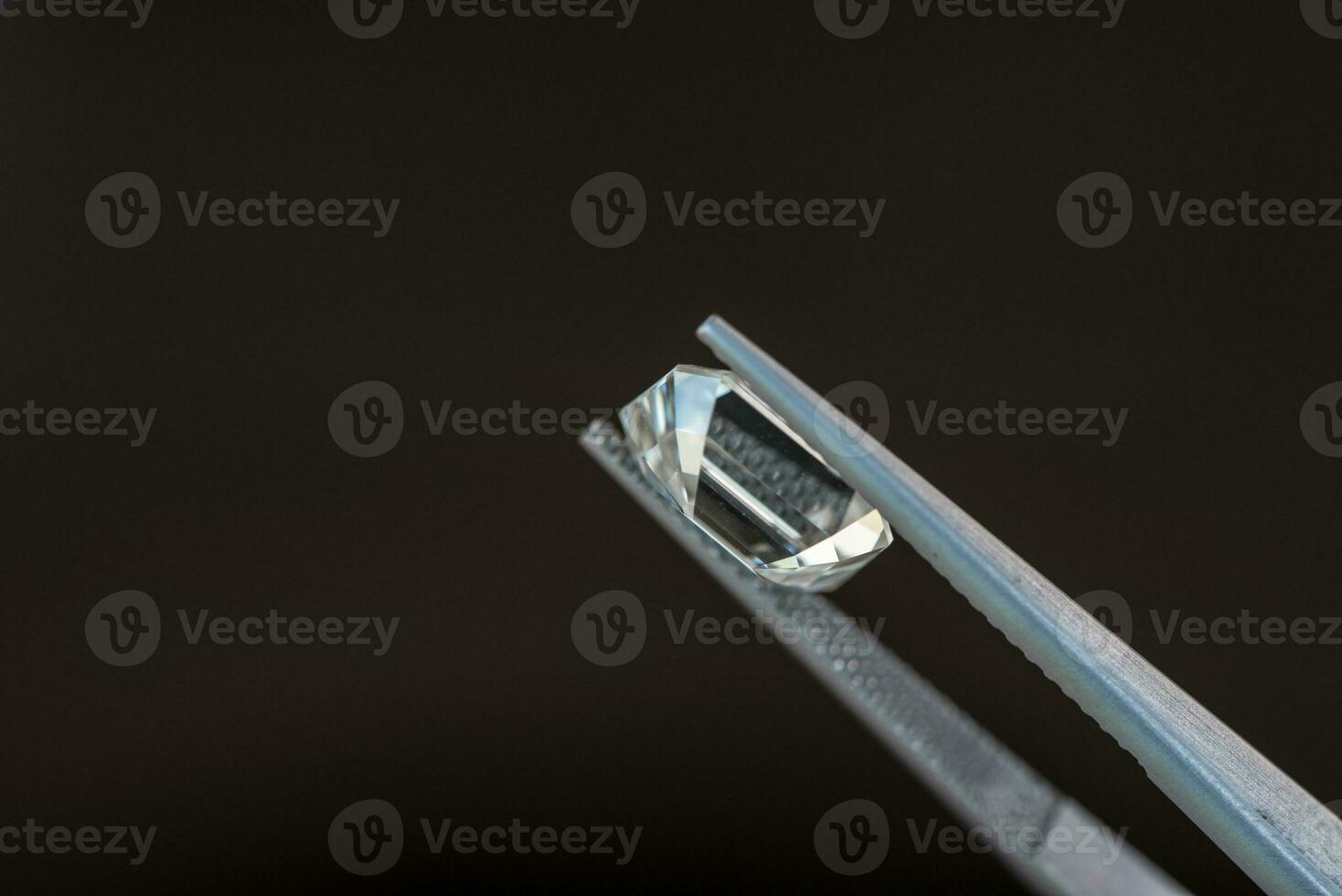 Diamond on black background photo