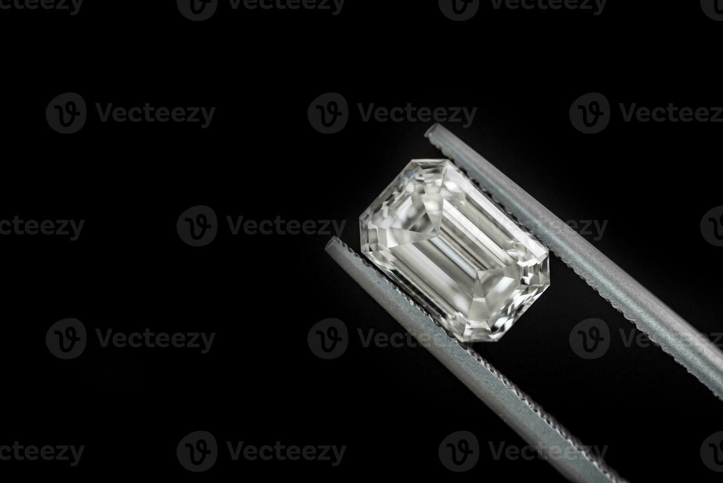 Diamond on black background photo