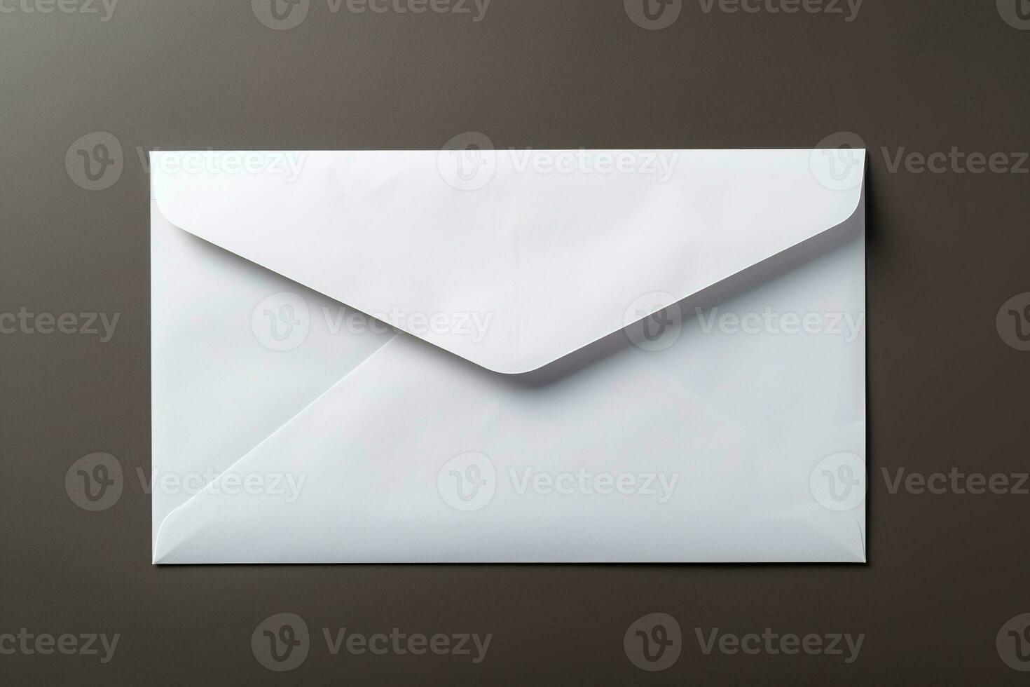 Blank white envelope isolated on gray background. Salary concept in envelope. Mail photo