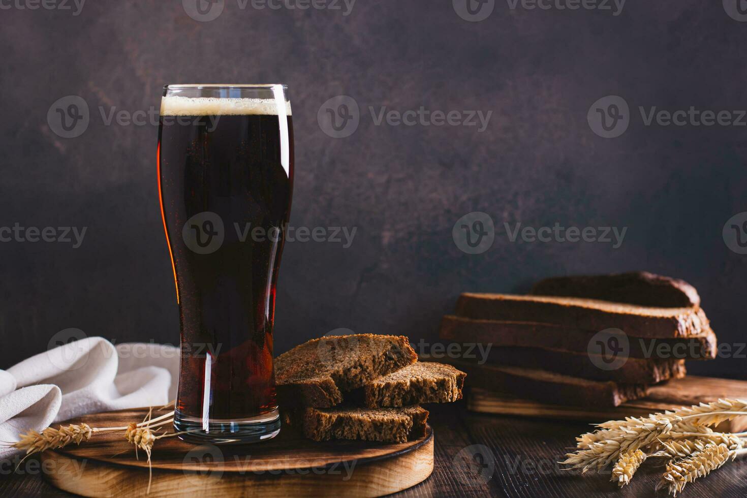 Kvass traditional drink made from fermented bread in a glass on the table photo
