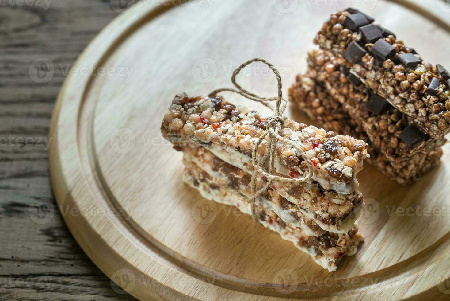 Granola bars with dried berries and chocolate photo