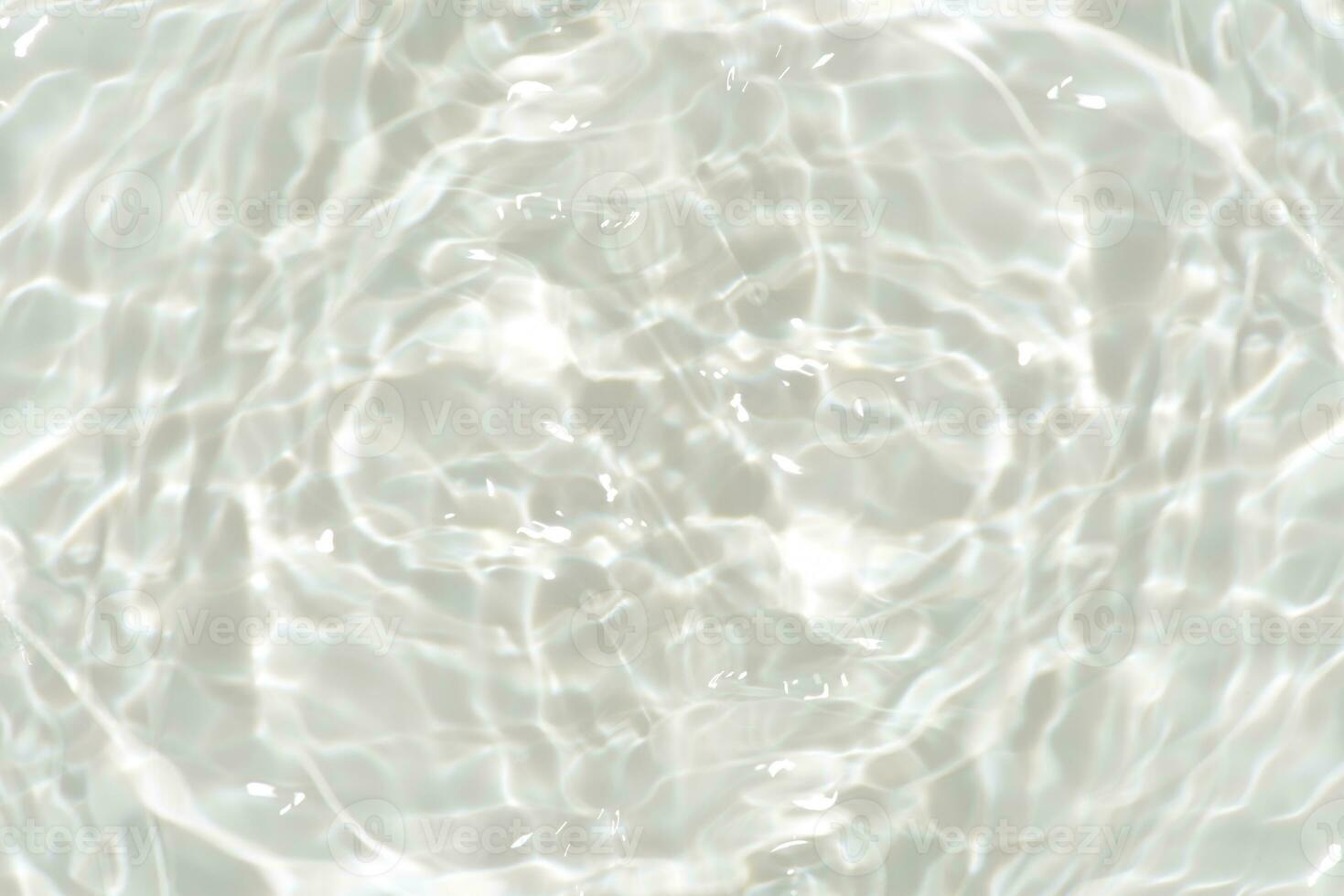Blue water with ripples on the surface. Defocus blurred transparent blue colored clear calm water surface texture with splashes and bubbles. Water waves with shining pattern texture background. photo