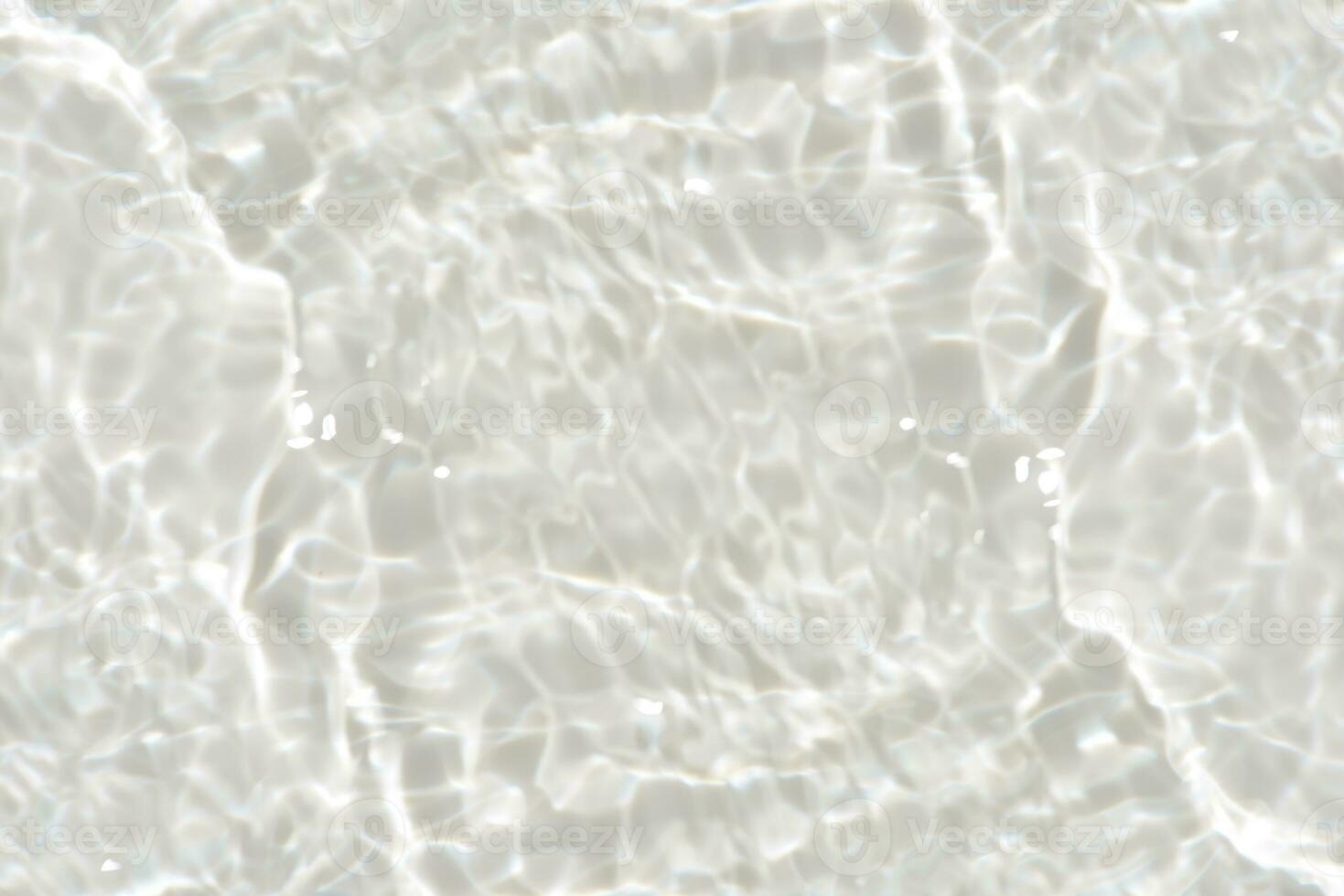 Blue water with ripples on the surface. Defocus blurred transparent blue colored clear calm water surface texture with splashes and bubbles. Water waves with shining pattern texture background. photo