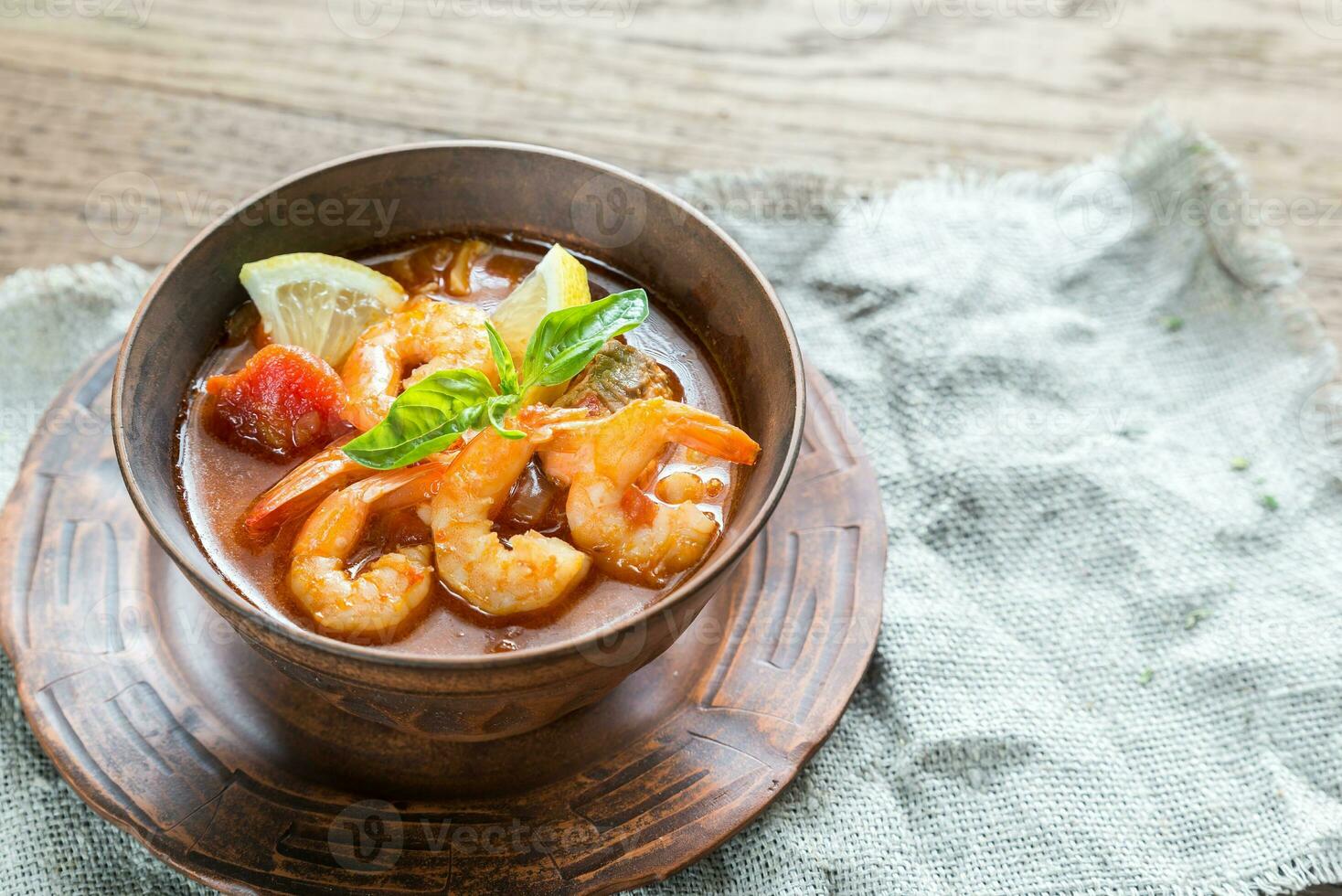 Spicy french soup with seafood photo