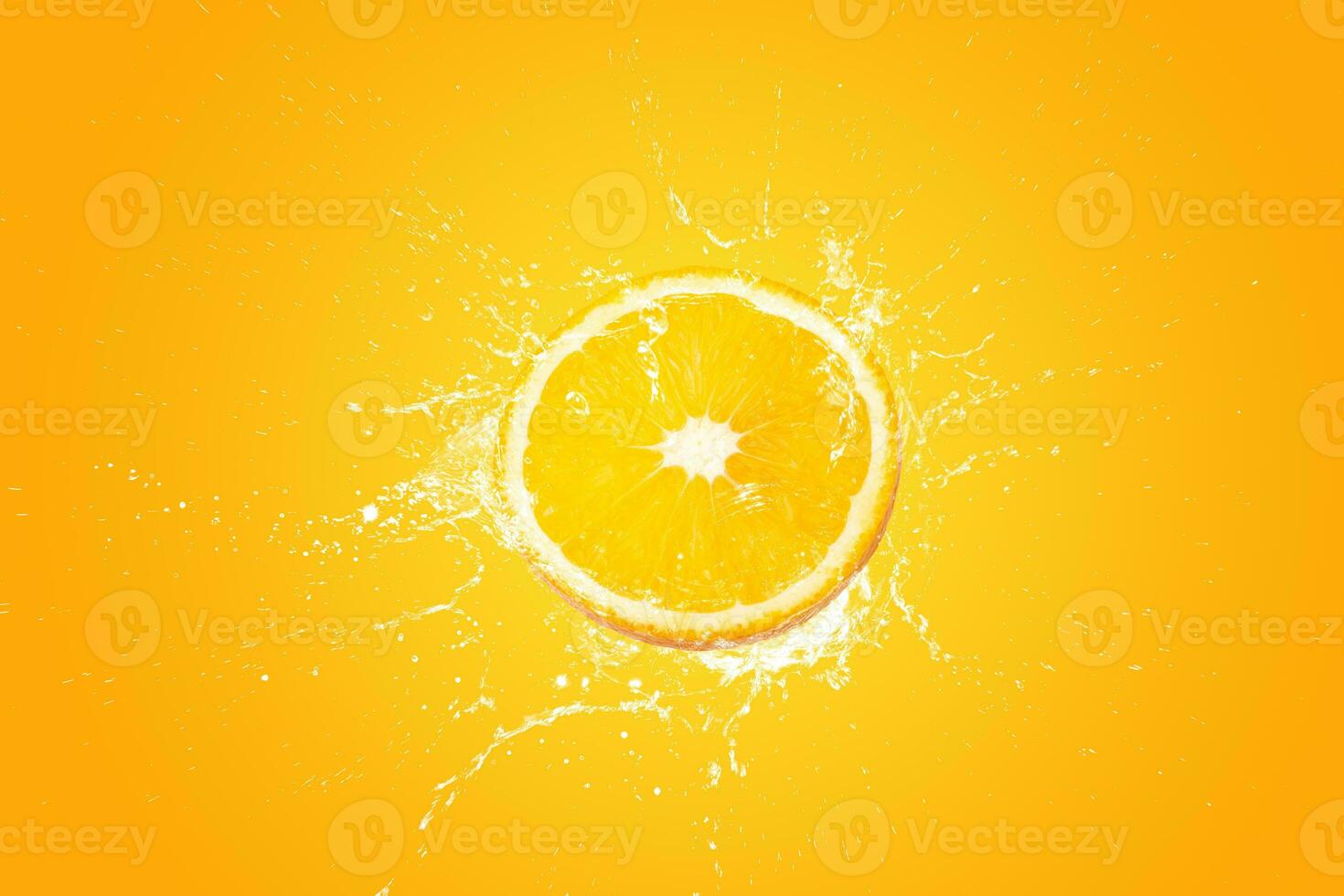 Creative layout made from Fresh Sliced oranges and Orange fruit and water Splashing on a orange background. photo