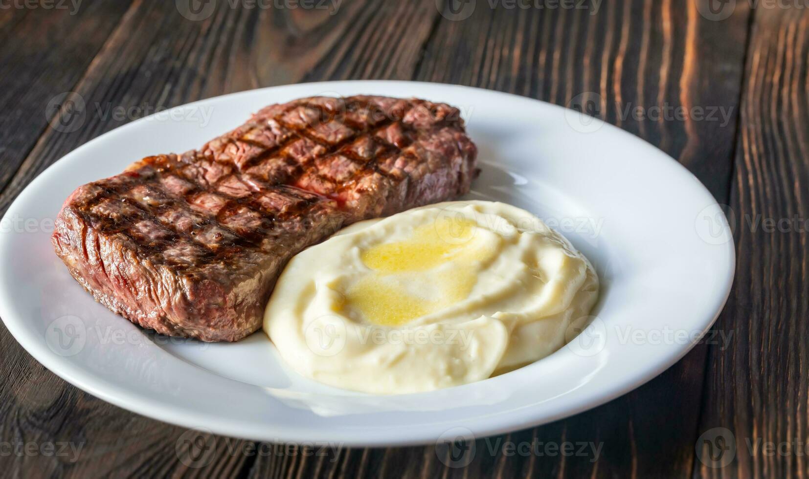 Strip steak with celery puree photo