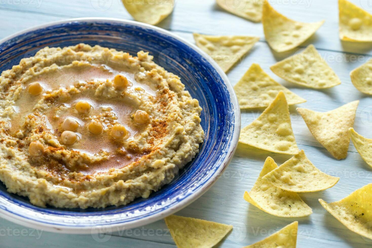 Hummus with tortilla chips photo