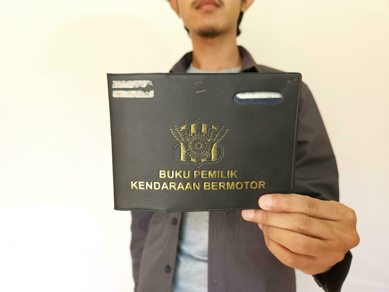 indonesio libro vehículo propietarios o comúnmente conocido como buku pemilik kendaraan bermotor bpkb. participación bpkb foto