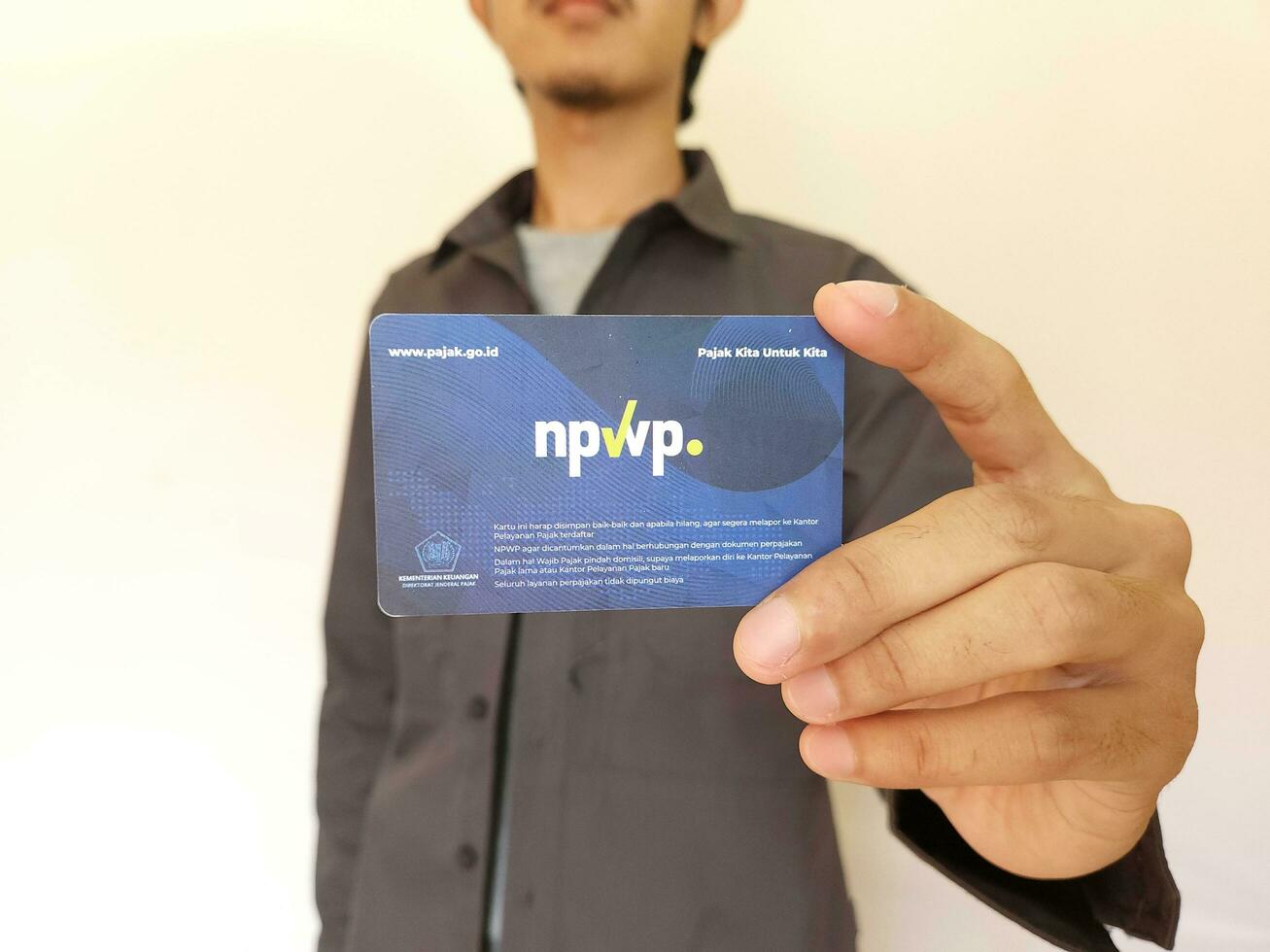 holding Indonesia Tax Card or NPWP Ministry of Finance, Republic of Indonesia. Directorate General of Taxation photo