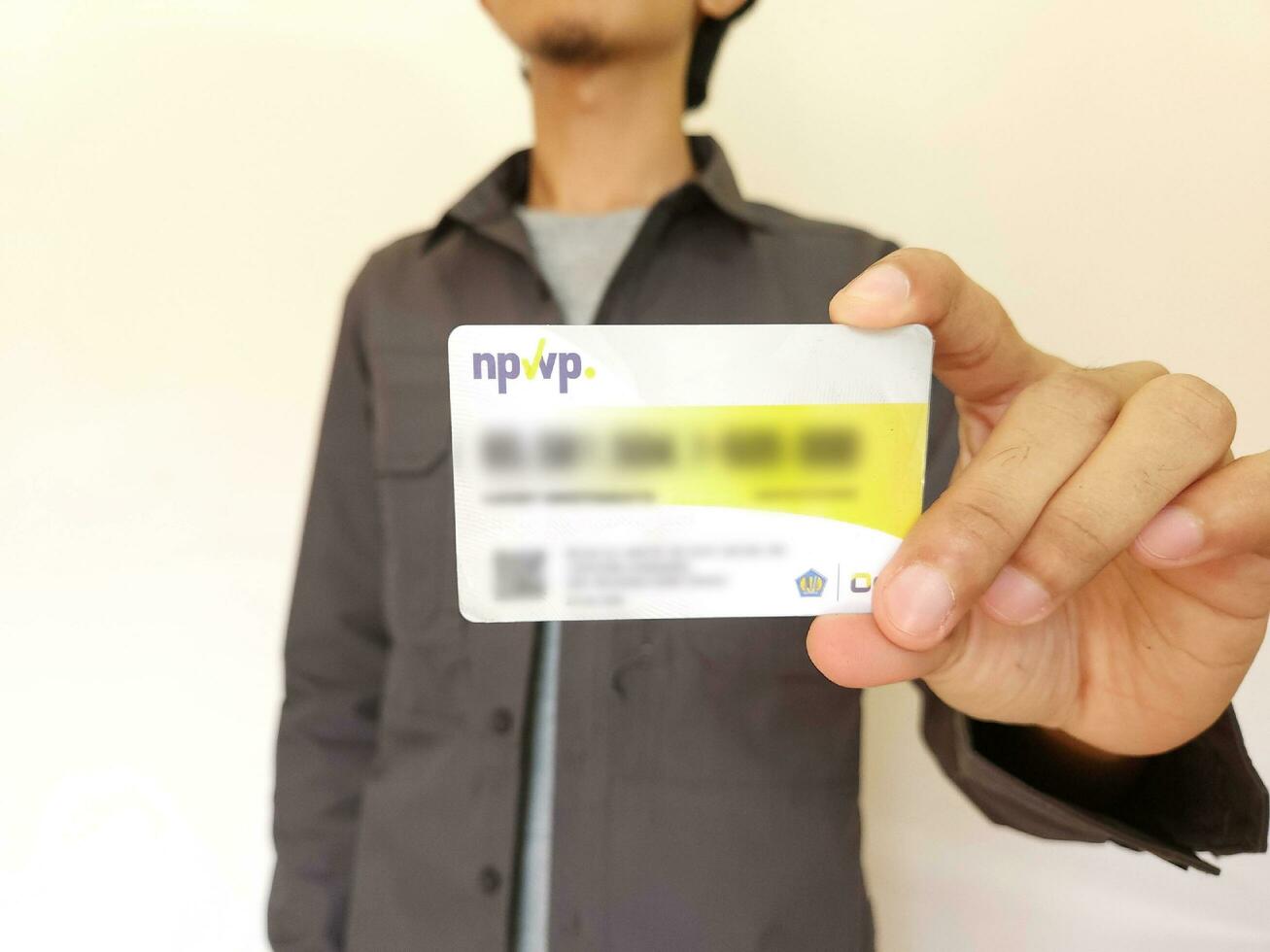 holding Indonesia Tax Card or NPWP Ministry of Finance, Republic of Indonesia. Directorate General of Taxation photo