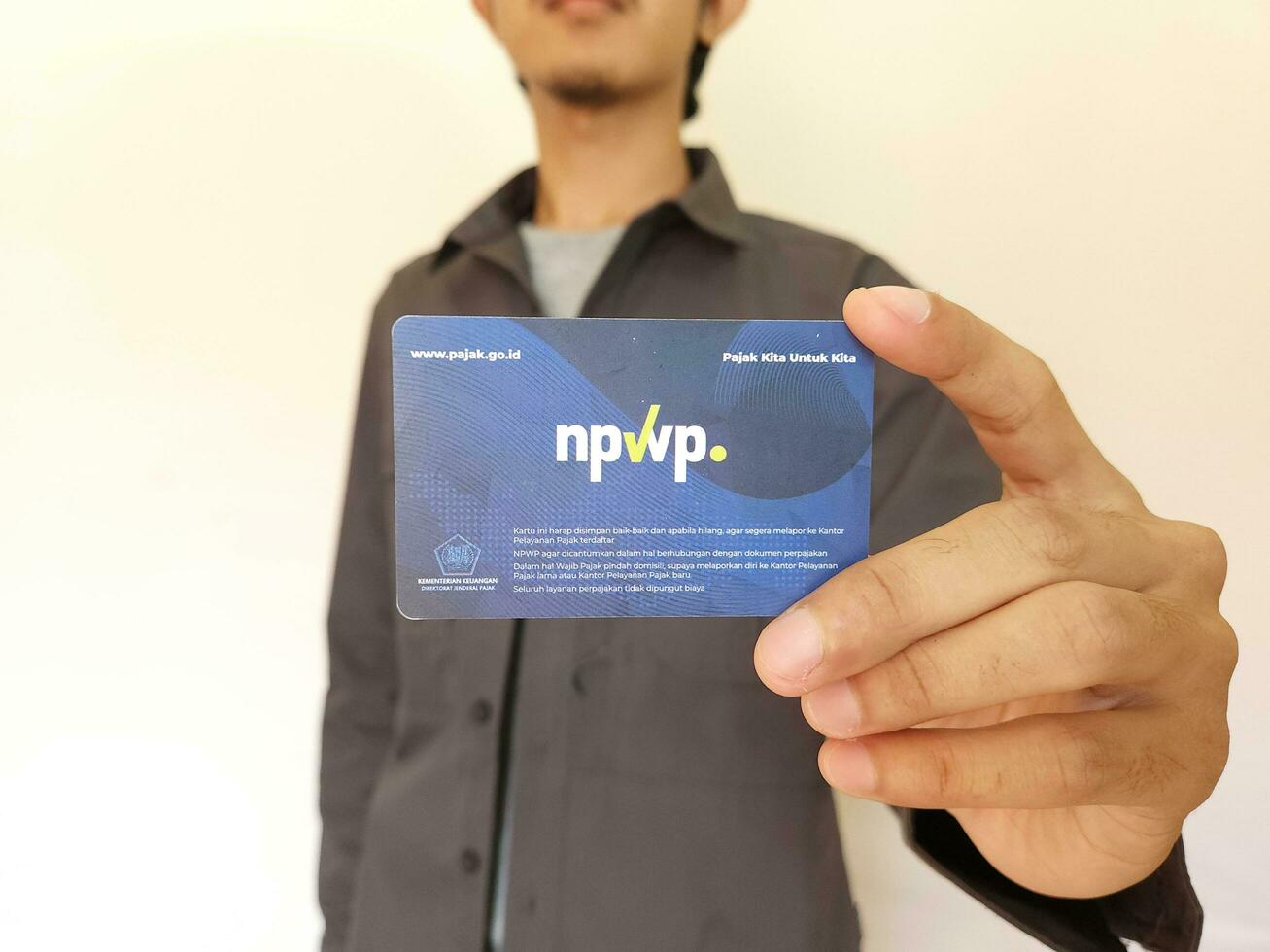 holding Indonesia Tax Card or NPWP Ministry of Finance, Republic of Indonesia. Directorate General of Taxation photo