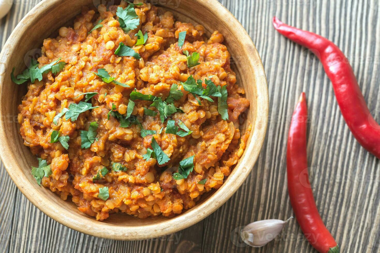 Bowl of red lentil curry photo