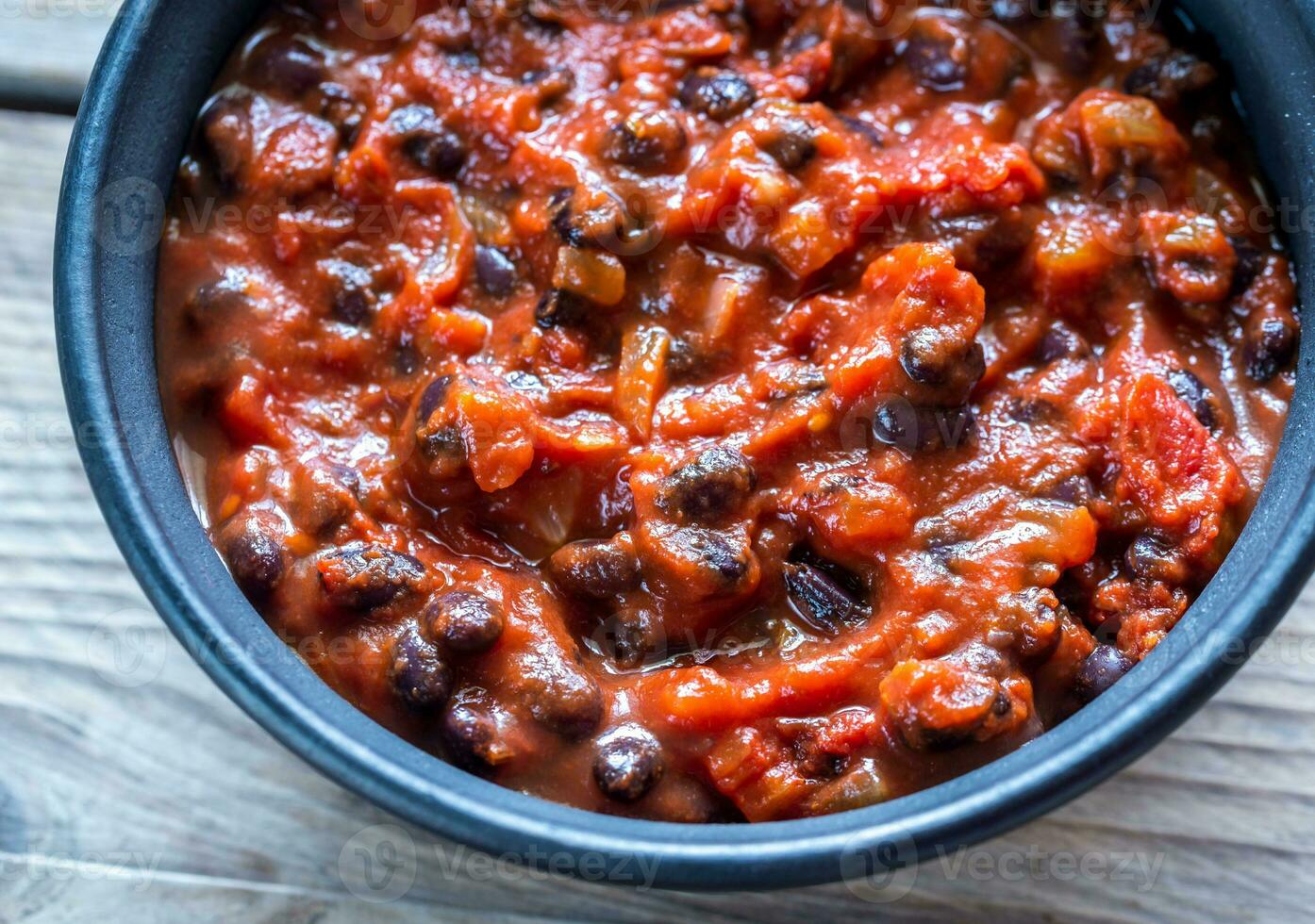 Bowl of black bean chili photo