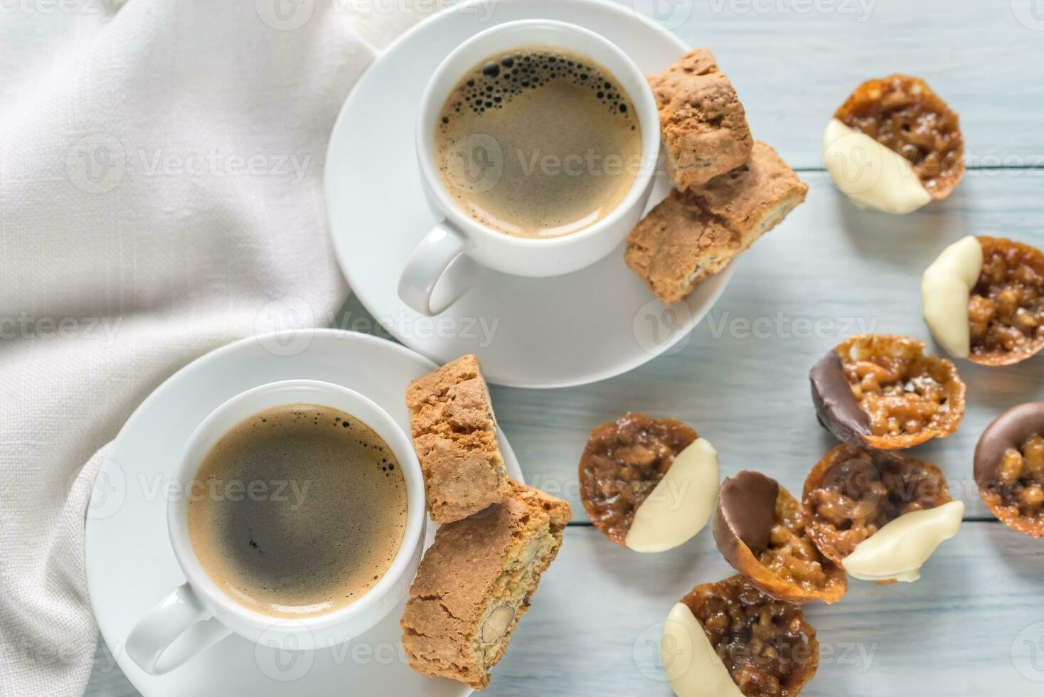 Cups of coffee with florentine cookies photo