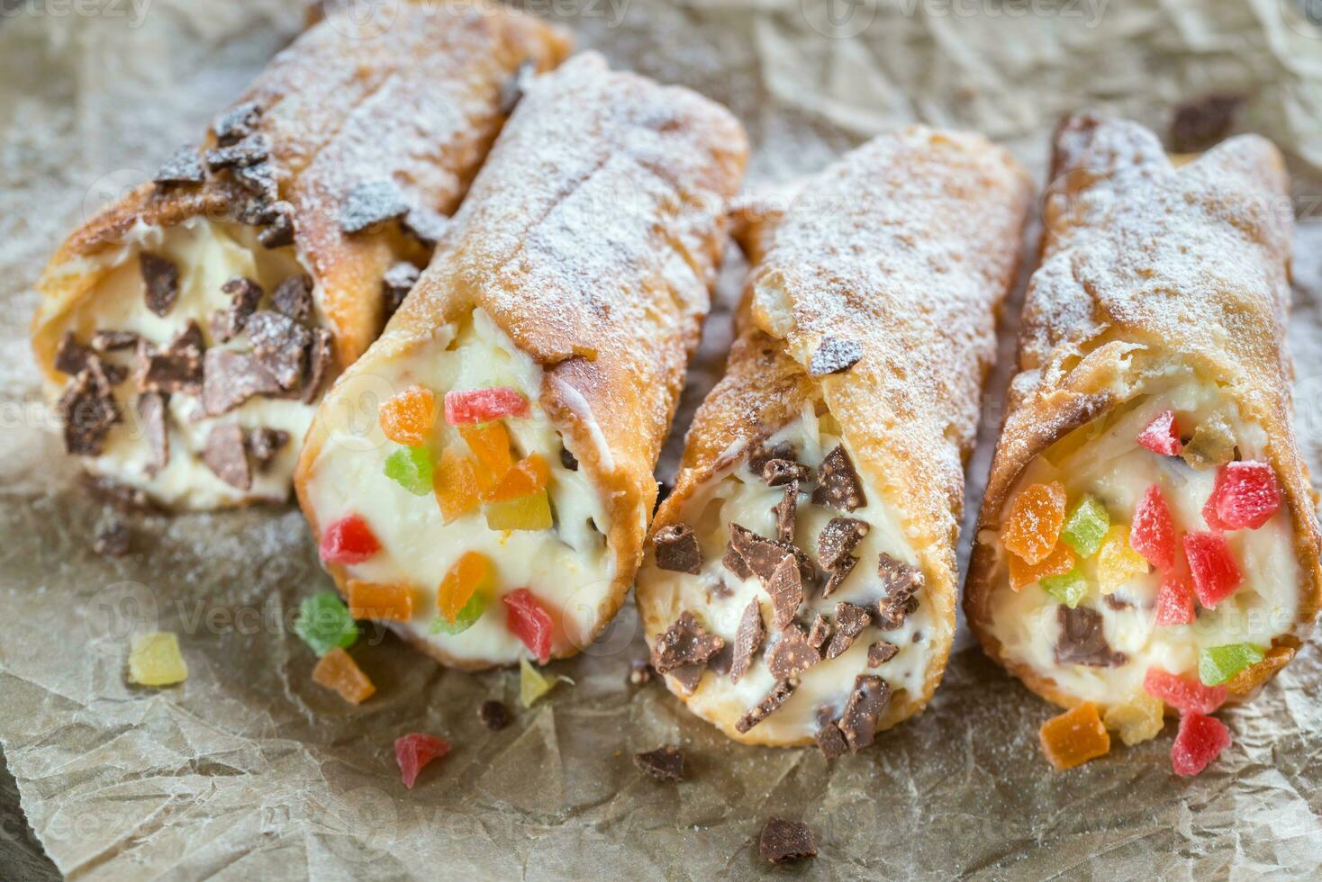 Cannoli stuffed with cream cheese photo