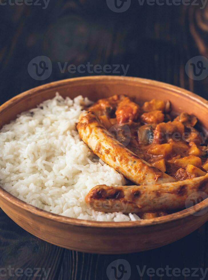 Thai red curry with sausages photo