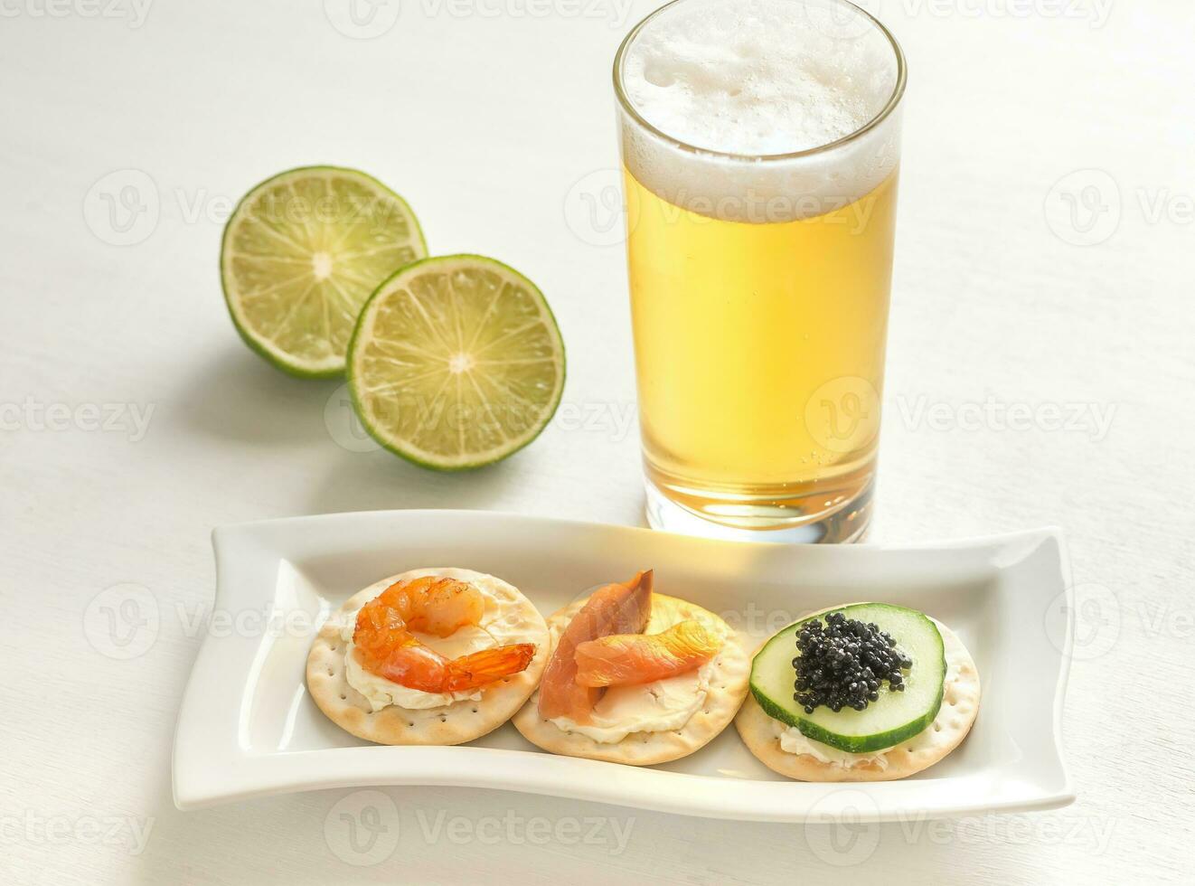 Canape with seafood on the plate photo