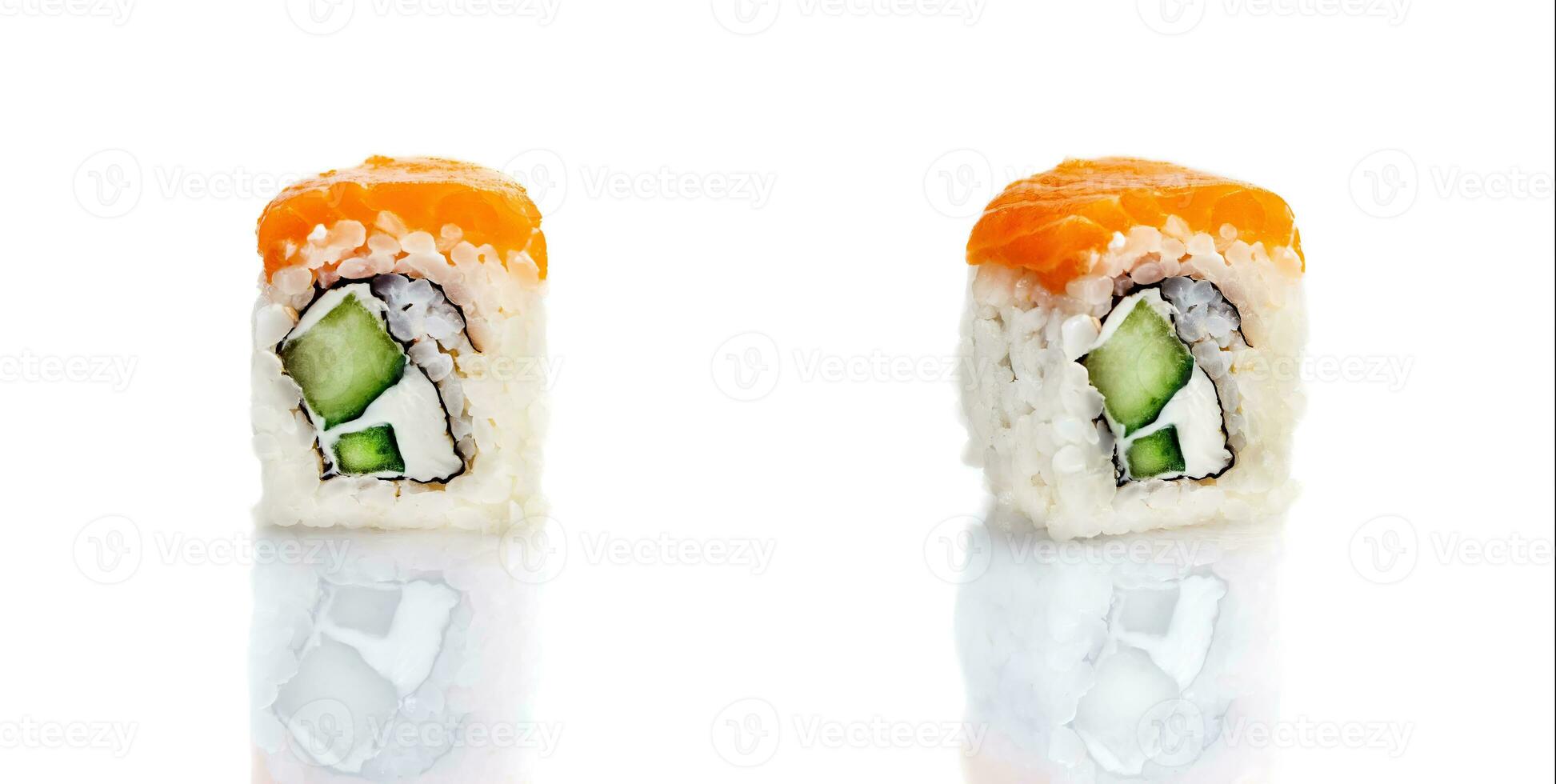 Set of three sushi rolls on a white plate with reflection. Sushi roll with rice, tofu cheese, flying fish roe, crab meat and avocado, salmon. Sushi menu. Japanese and Asian cuisine, restaurant. photo