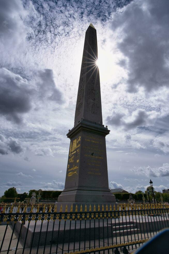 France, Paris, 20.08.2023,The Luxor Obelisks are a pair of ancient Egyptian obelisks, over 3,000 years old, carved to stand either side of the portal of the Luxor Temple in the reign of Ramesses II photo