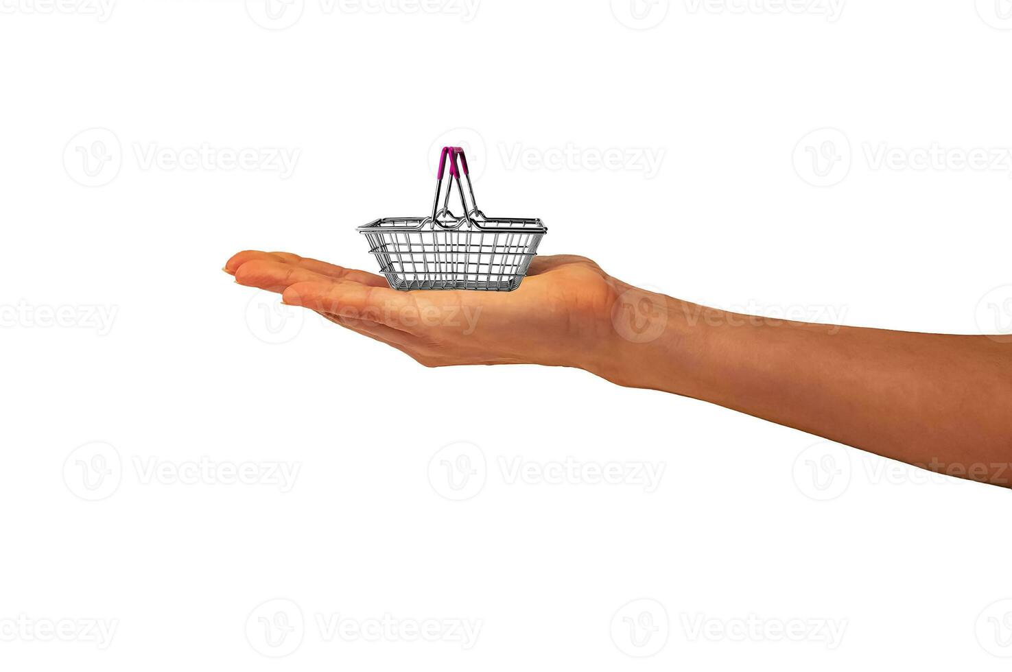 Empty shopping basket, made of chromed metal wire with a crimson rubber handle,  on woman's hand on a white background. Isolate. Side view. Black Friday sales photo