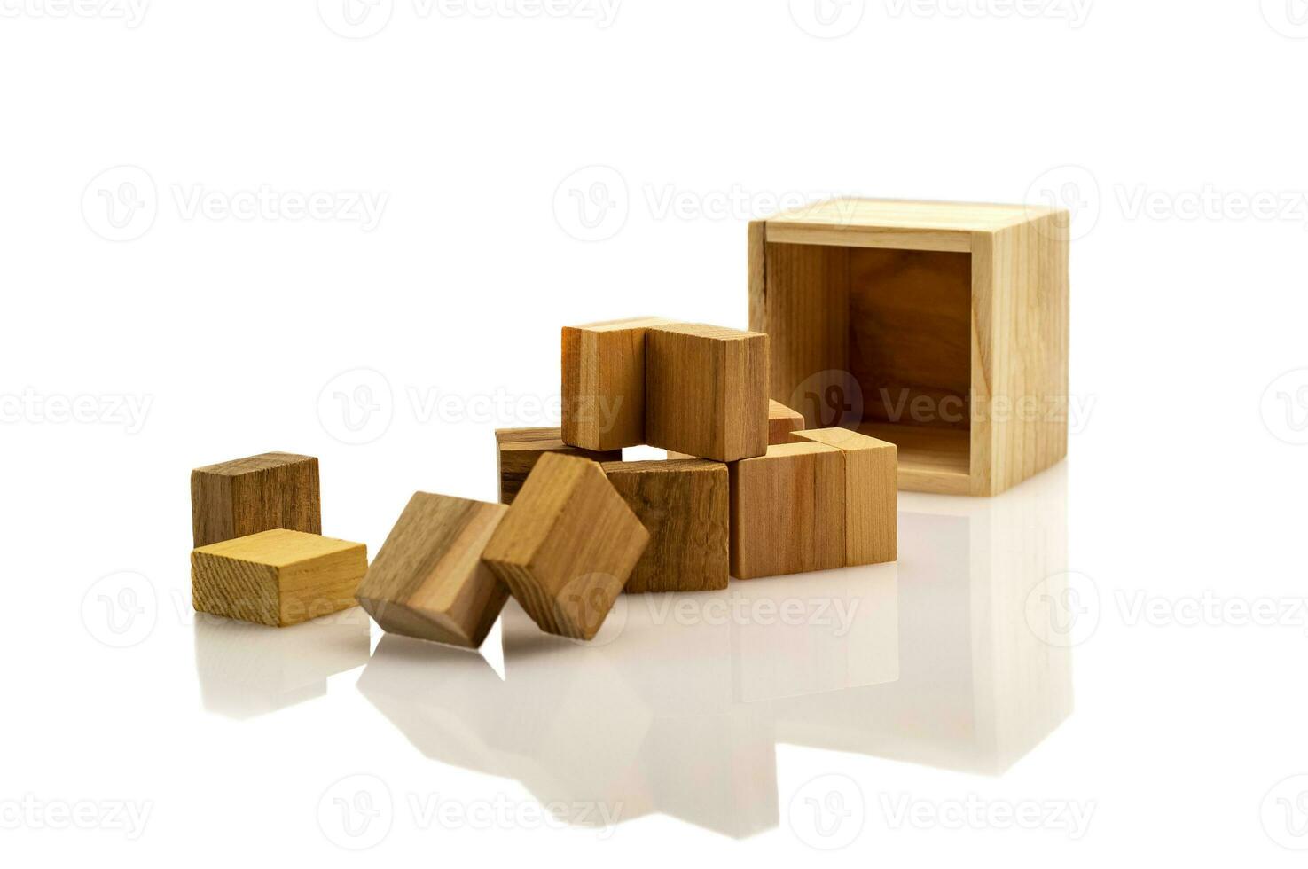 Wooden brain cube. Wooden puzzle made up of parts isolated on a white background. Business success concept. Layout for presentation. photo