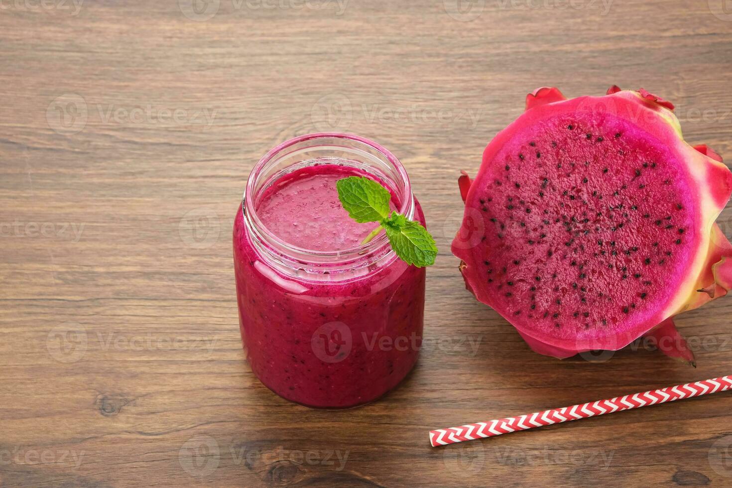 Delicious dragon fruit or pitahaya smoothie and fresh fruits with mint ...