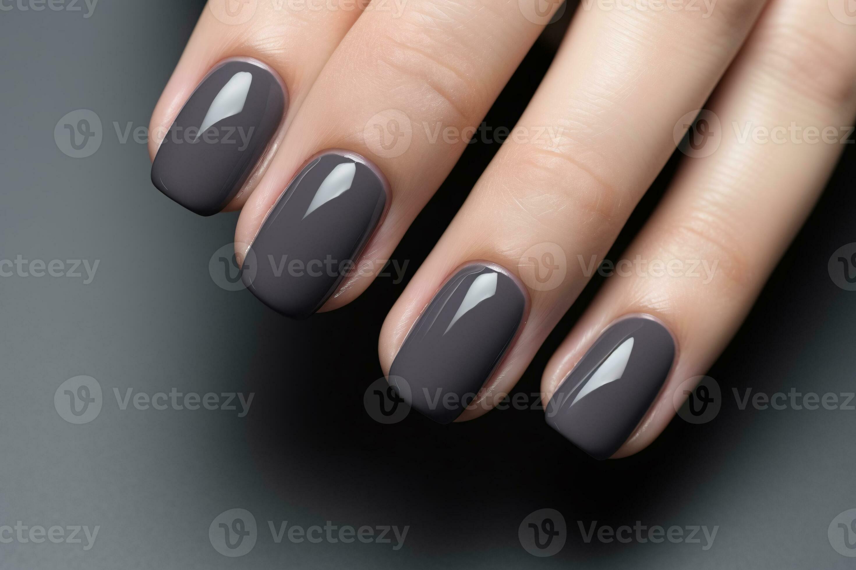 Modern charcoal gray nail polish