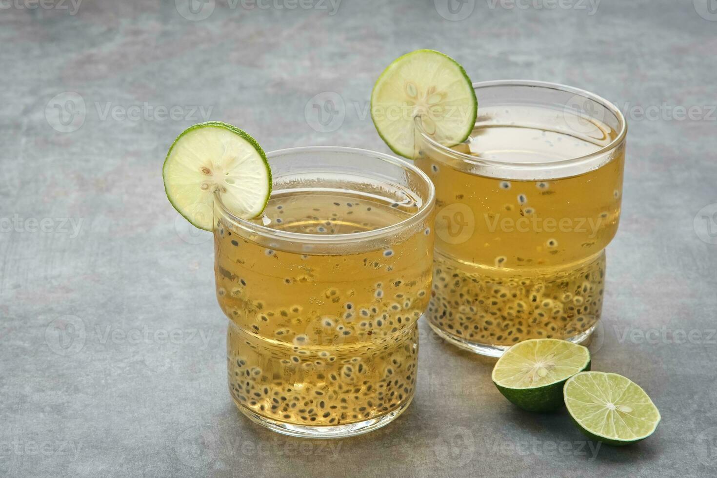 Chamomile tea with lime and basil seed photo