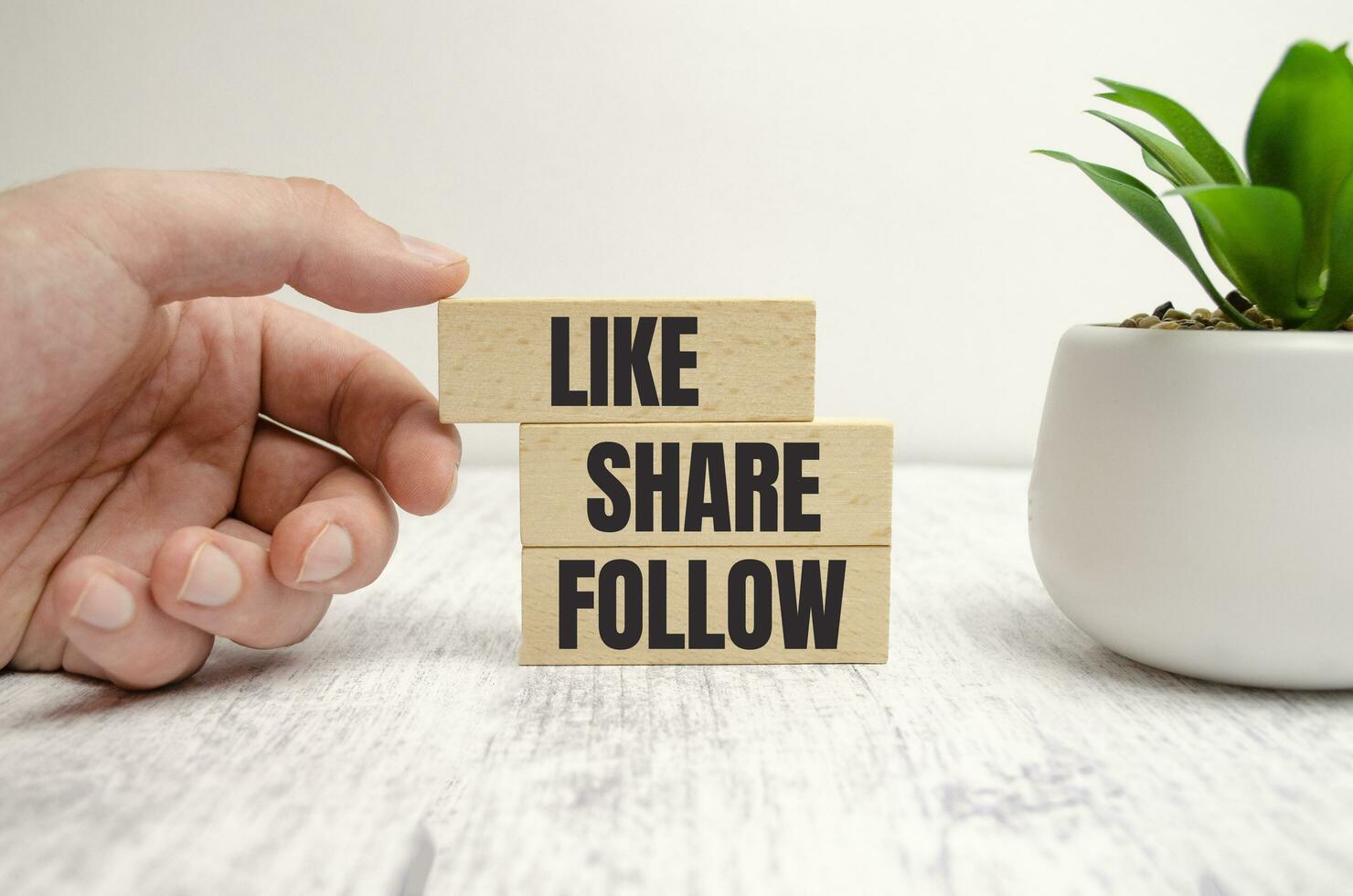 Share, like and follow. Social media marketing concept photo