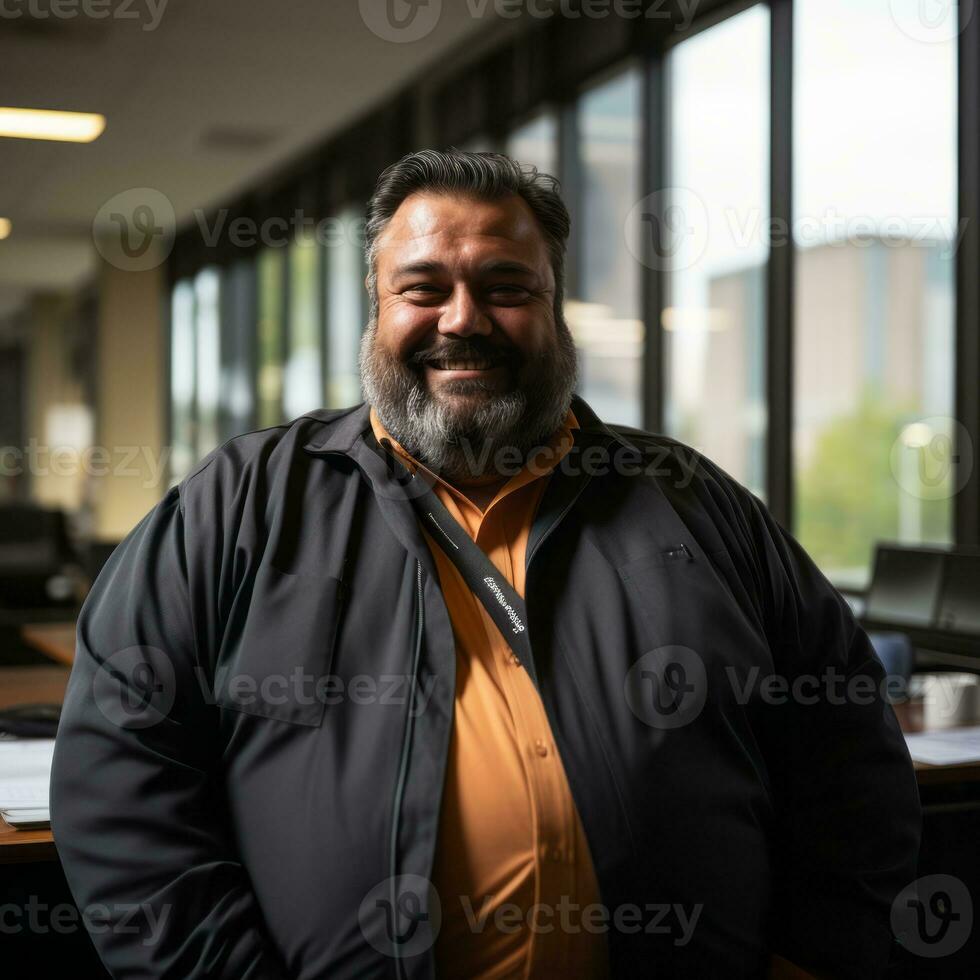 a man with a beard and orange shirt standing in front of a window generative ai photo