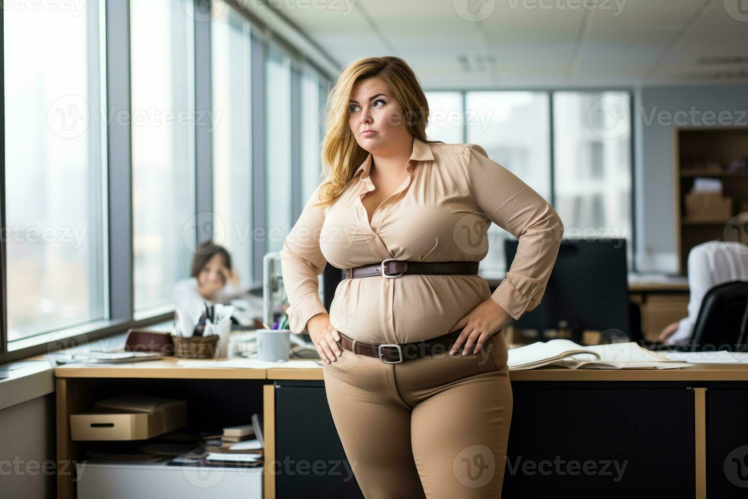 a pregnant woman standing in an office with her hands on her hips generative ai photo