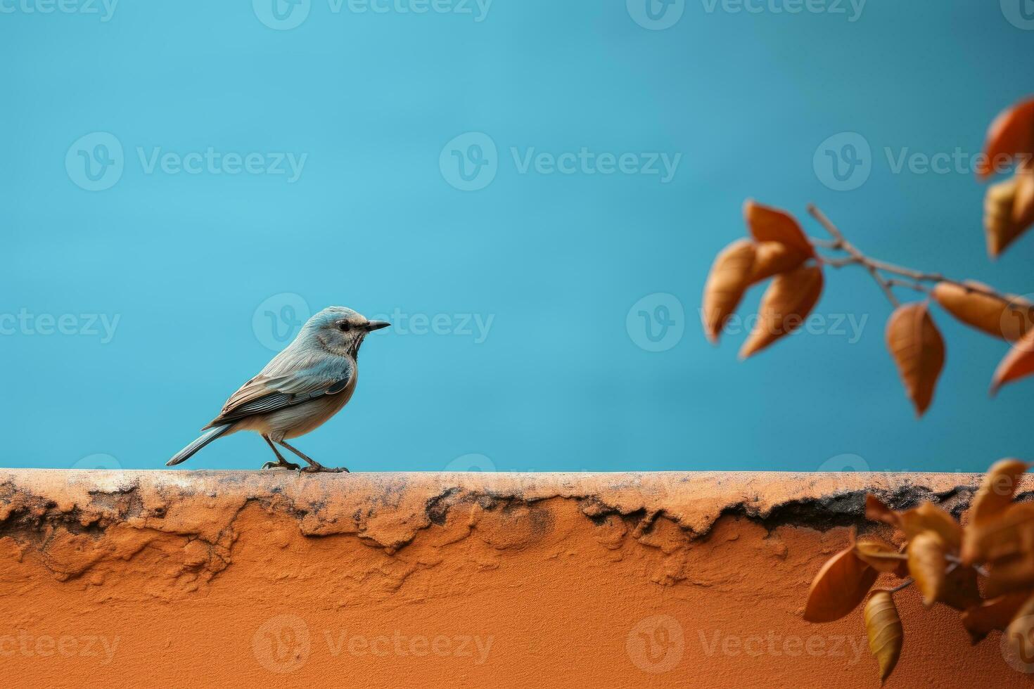 a small bird is perched on the edge of a wall generative ai photo