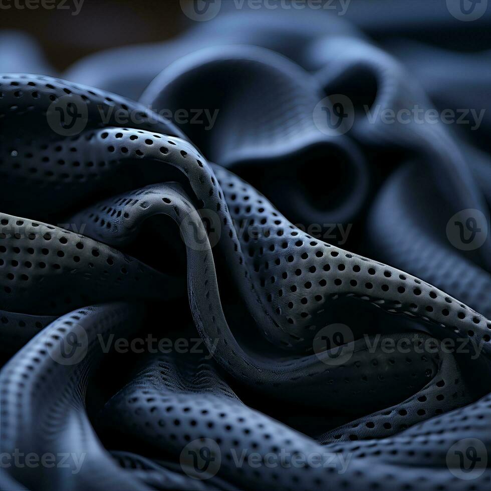 a close up of a black fabric with holes in it generative ai photo