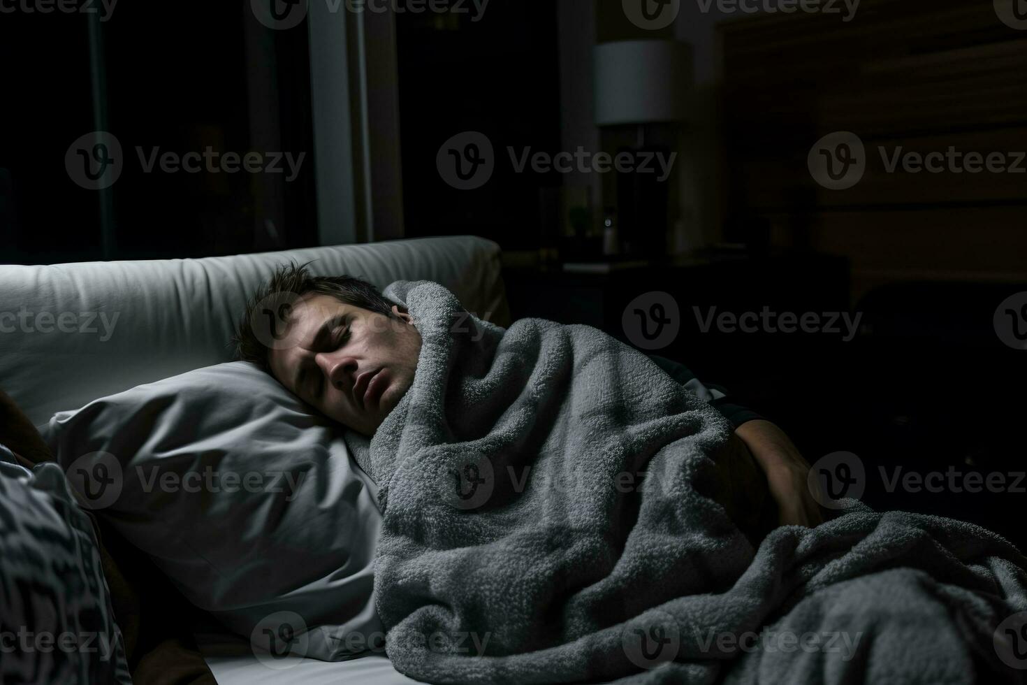 a man is sleeping in bed with a blanket generative ai photo