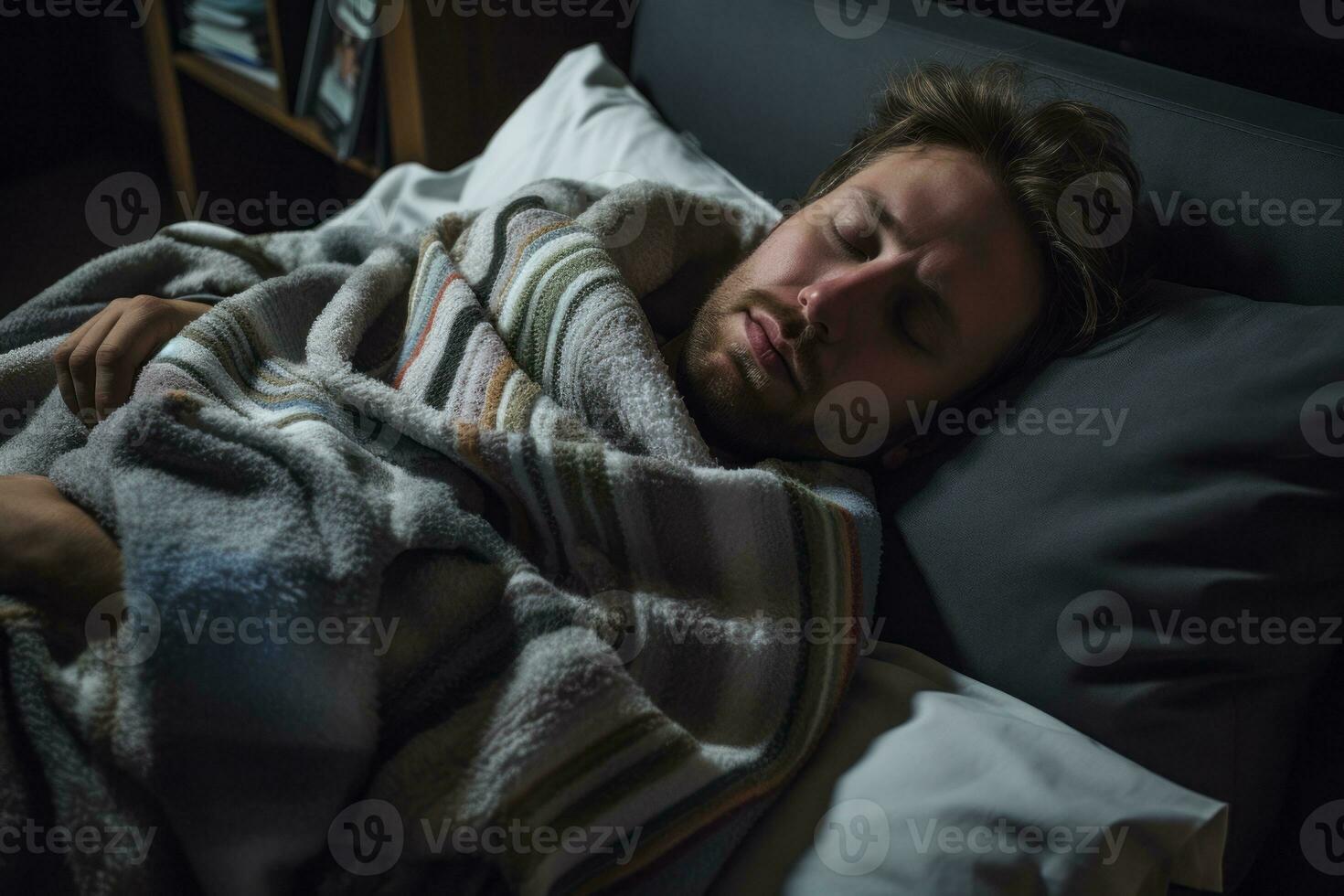 a man is sleeping in bed with a blanket generative ai photo