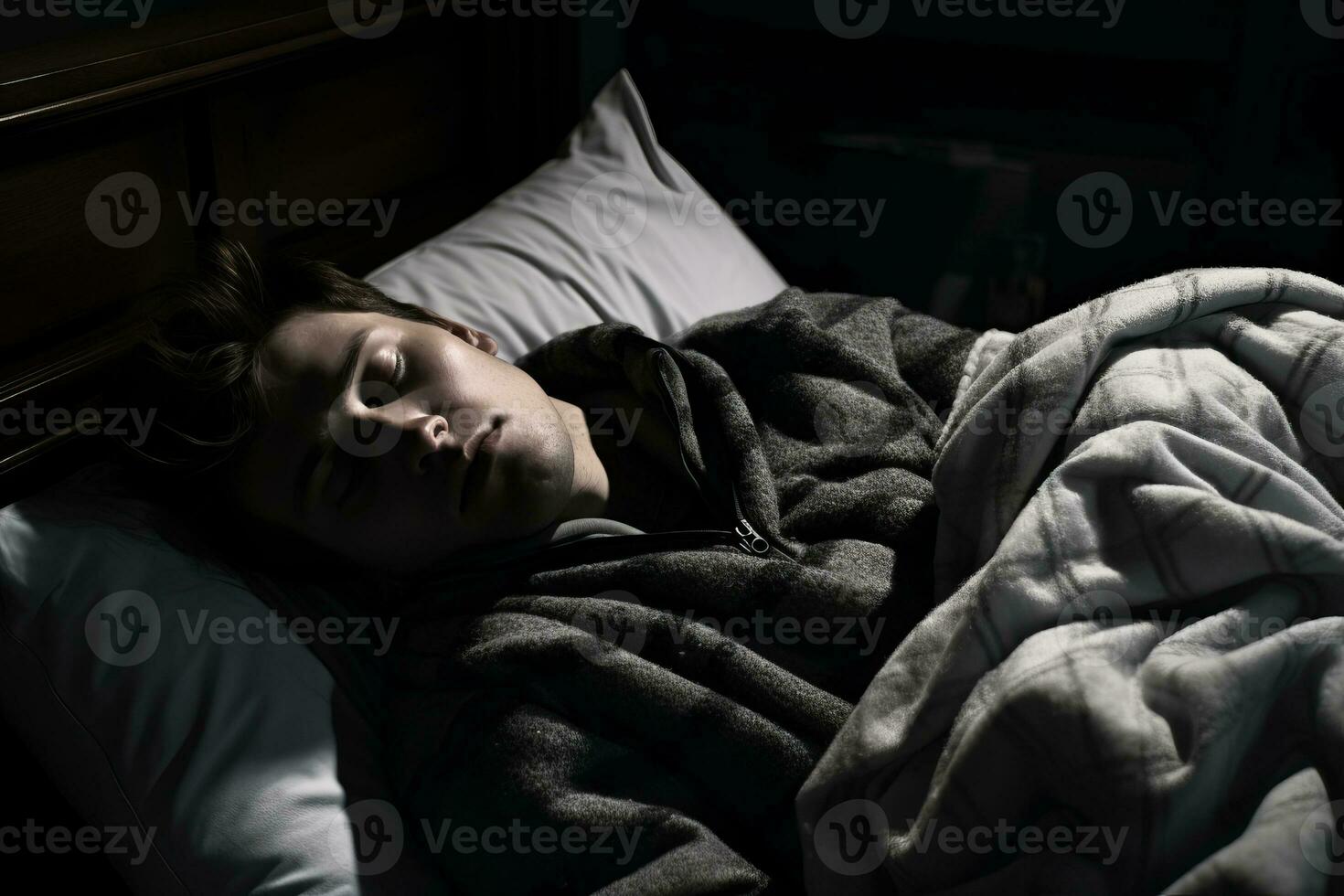 a young man is sleeping in bed at night generative ai photo