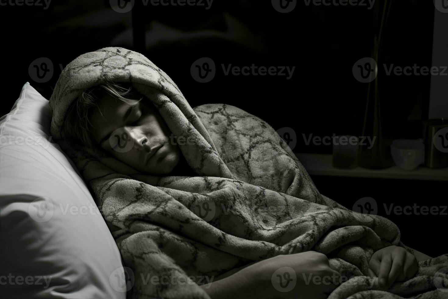 a young man is wrapped up in a blanket generative ai photo