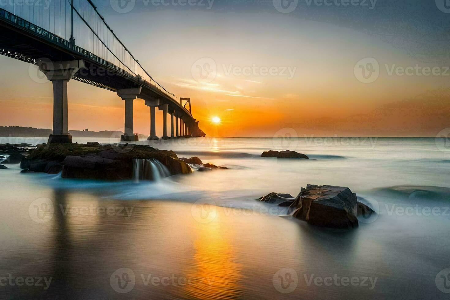 un puente terminado el Oceano a puesta de sol. generado por ai foto